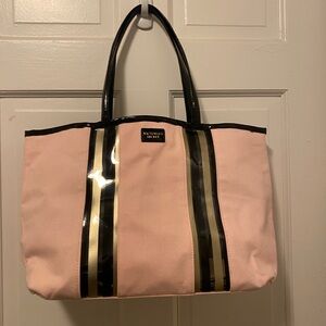 Victoria's Secret Pink Tote with Black and Gold Stripes son las dos bolsas